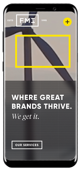 The image shows a smartphone displaying a web page with the slogan "Where great brands thrive. We get it." and a button labeled "OUR SERVICES".